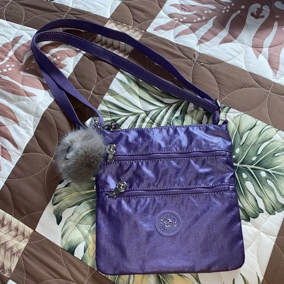 NWT Kipling Metallic purple Crossbody Bag with Pom Pom - Picture 1 of 7